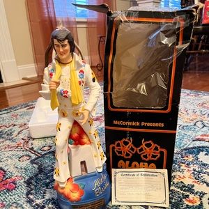 Elvis 1977 whiskey decanter with music box. Music box does work